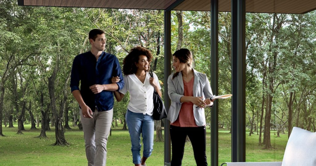 Buyers touring a home with a real estate agent in Nacogdoches County, Texas