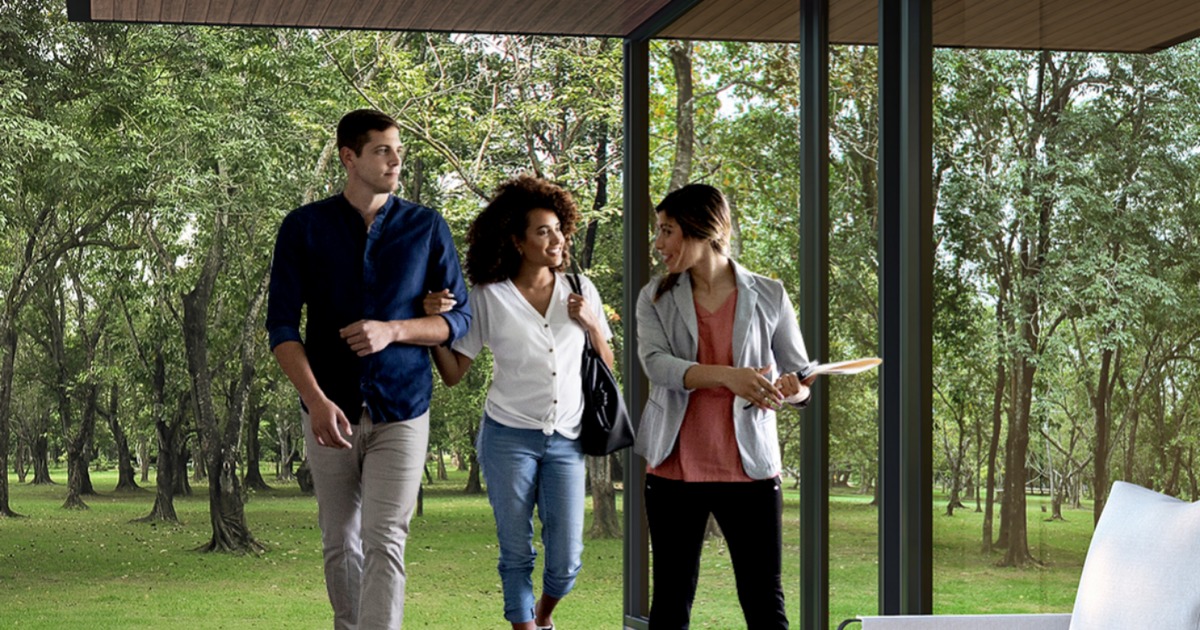 Buyers touring a home with a real estate agent in Nacogdoches County, Texas